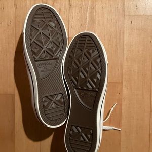 Women’s size 7 low top converse, white, poppies embroidered on the back heel.